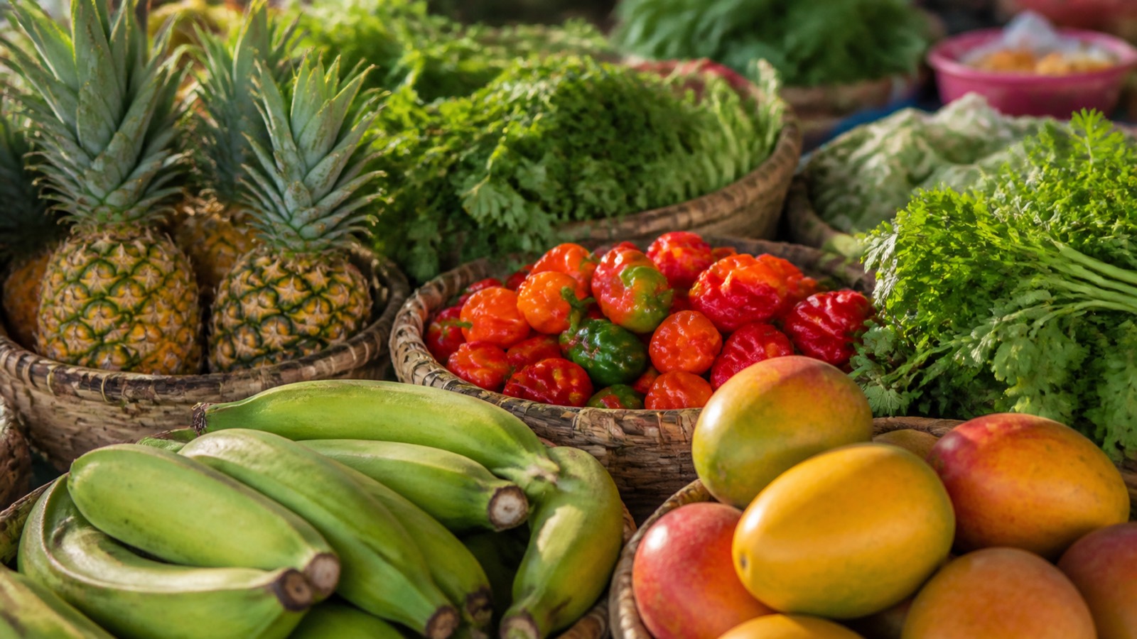 Market stalls piled with plantains, peppers, and fresh produce